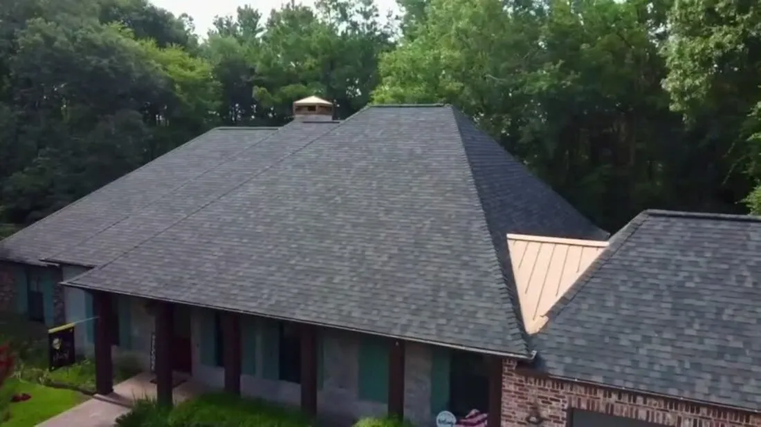 Aerial view of the same home after the new roof was installed